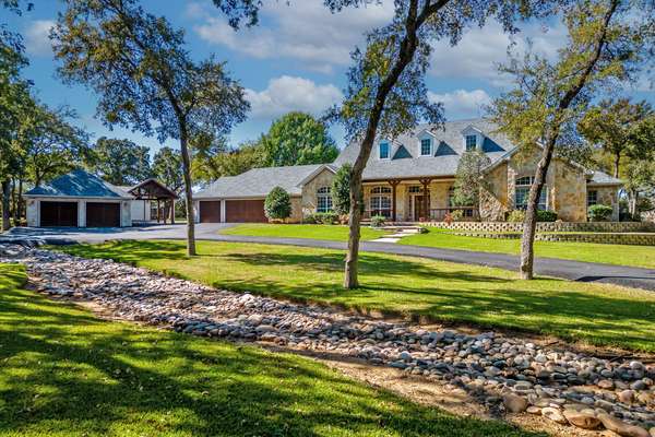 Custom Home, Pool, Shop, and Covered Parking for up to 6 Vehicles on 2.8 Parklike Acres