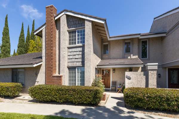 Move in Ready Supersized Townhouse with a Private Backyard & Finished Garage!