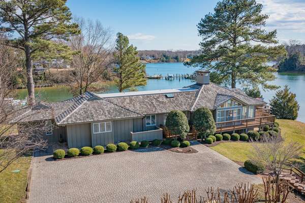Views of Carter’s Creek throughout this Architectural Gem!