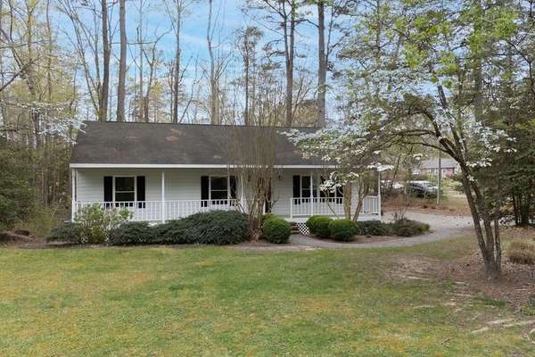 One Level Home with Great Curb Appeal and Community Amenities!