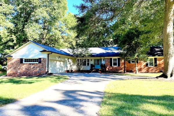 Welcome to this charming brick ranch home in Coulwood Hills!