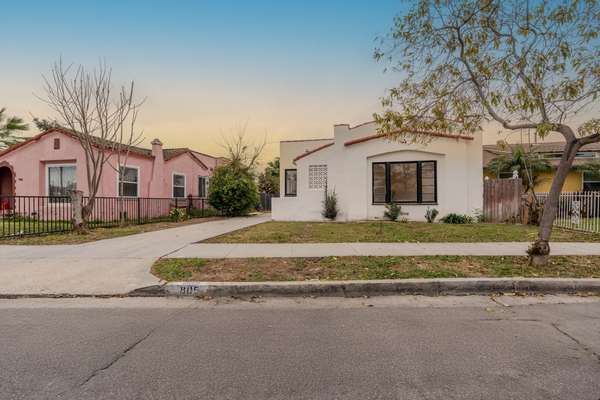 Versatile Duplex with Studio & Detached 2-Car Garage