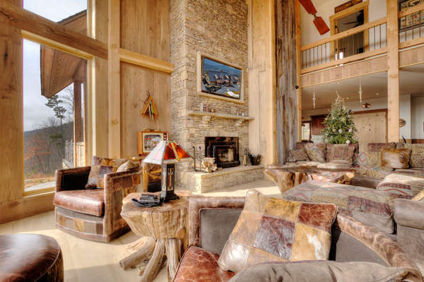 Cathedral Room featuring a Crab Orchard Stacked Stone Fireplace - Main Level