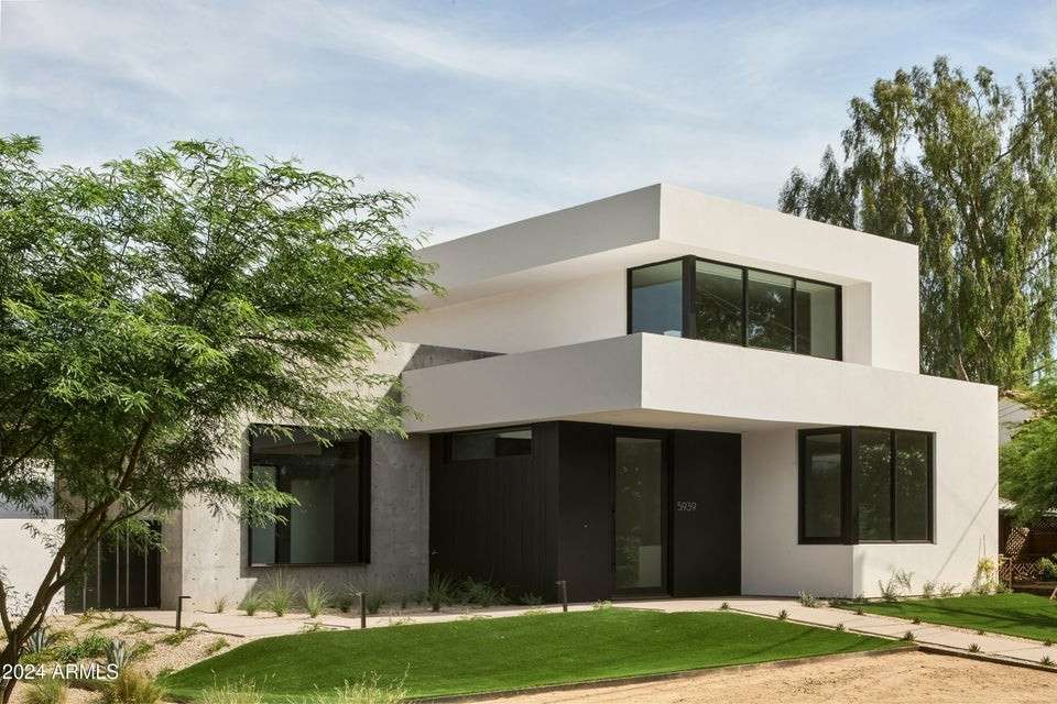 3 of 27. Flooded with natural light, the home s sculptural facade offers maximum impact. The thoughtful mix of stucco, concrete, and landscape elements captures the spirit of luxury desert living.